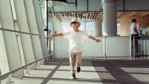 A child plays at the airport.