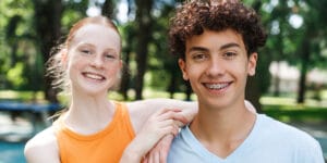 Teenage boy smiling with braces.