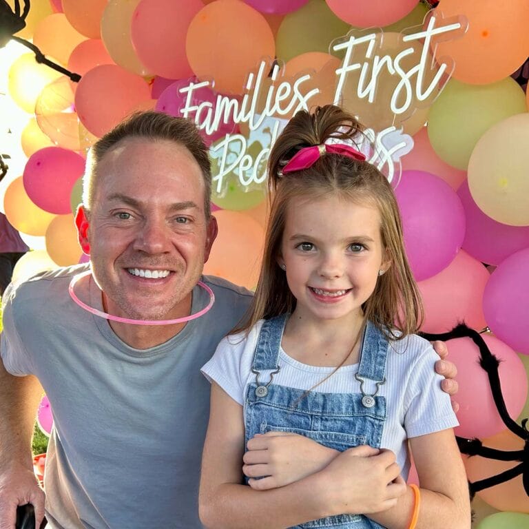 Smiling provider and child