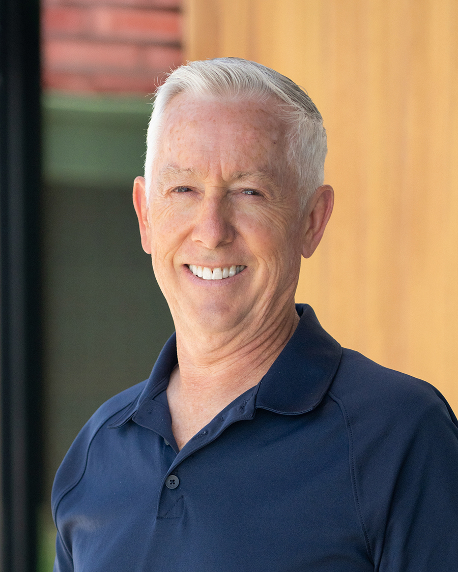 Outdoor headshot of Cory Stark DDS