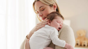 concerned mom with young baby