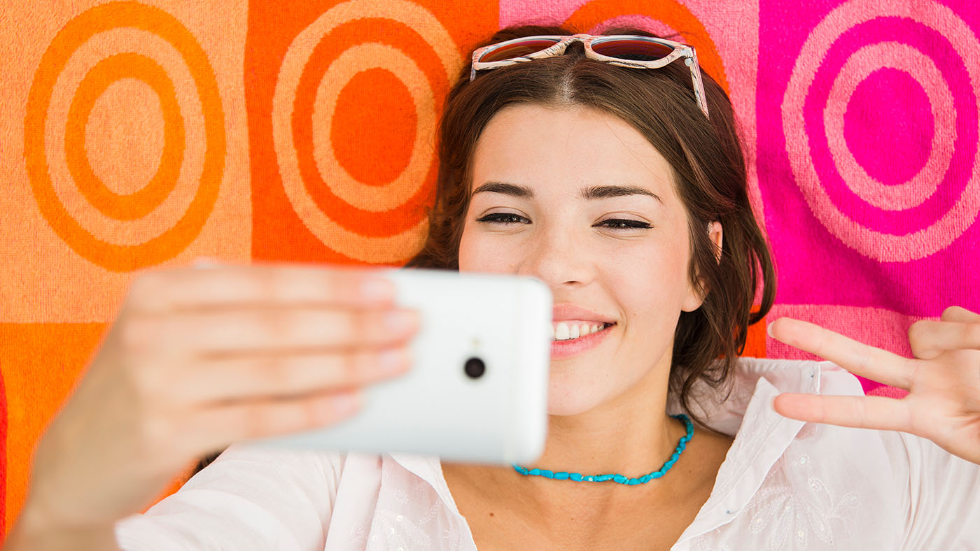 Young girl taking a selfie
