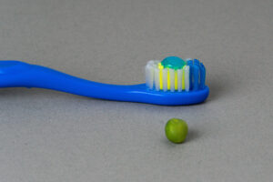 toothbrush with a pea size amount of toothpaste