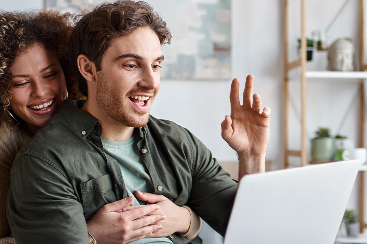 Young couple on virtual meeting