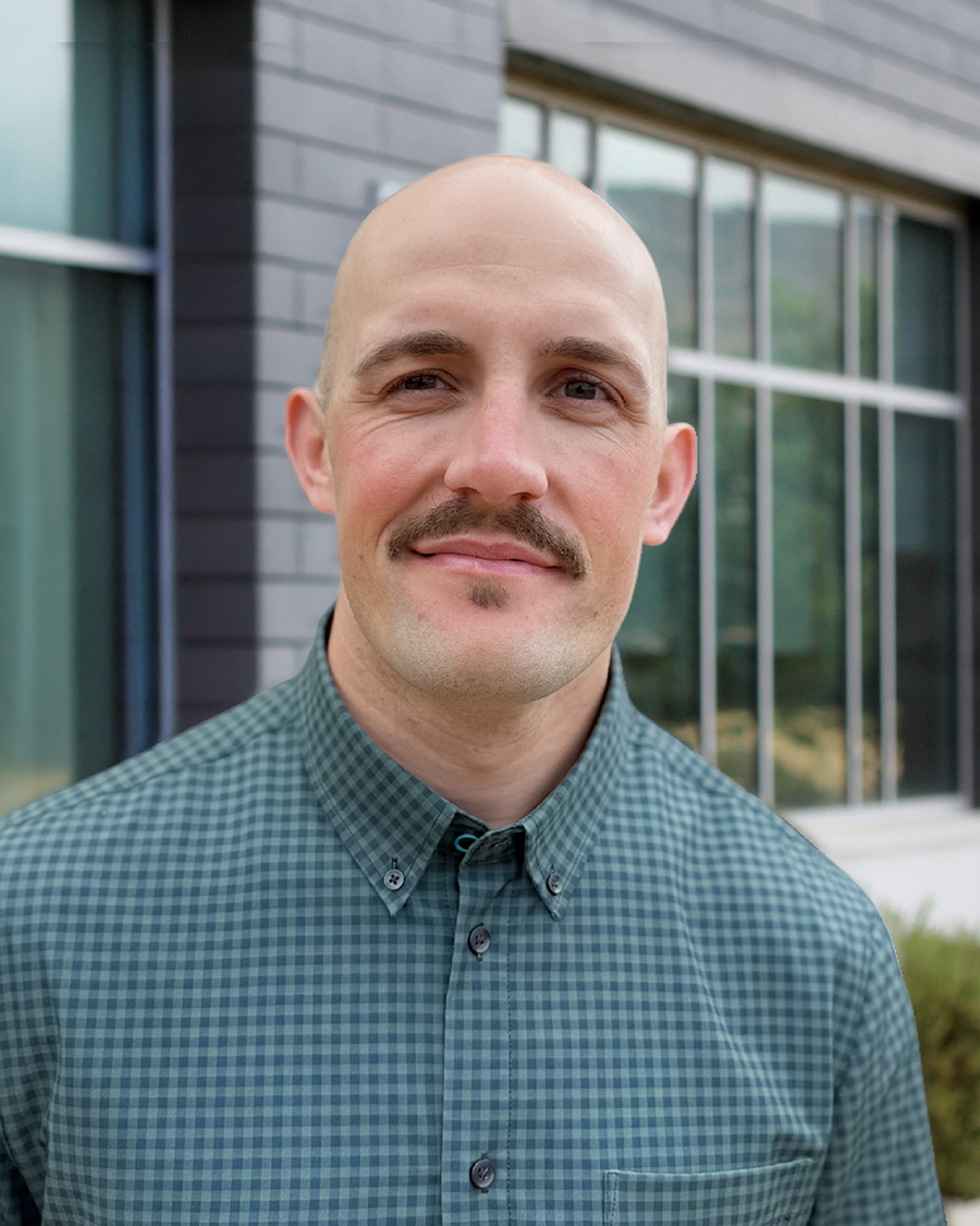 headshot of Wyatt Barrus outside the clinic