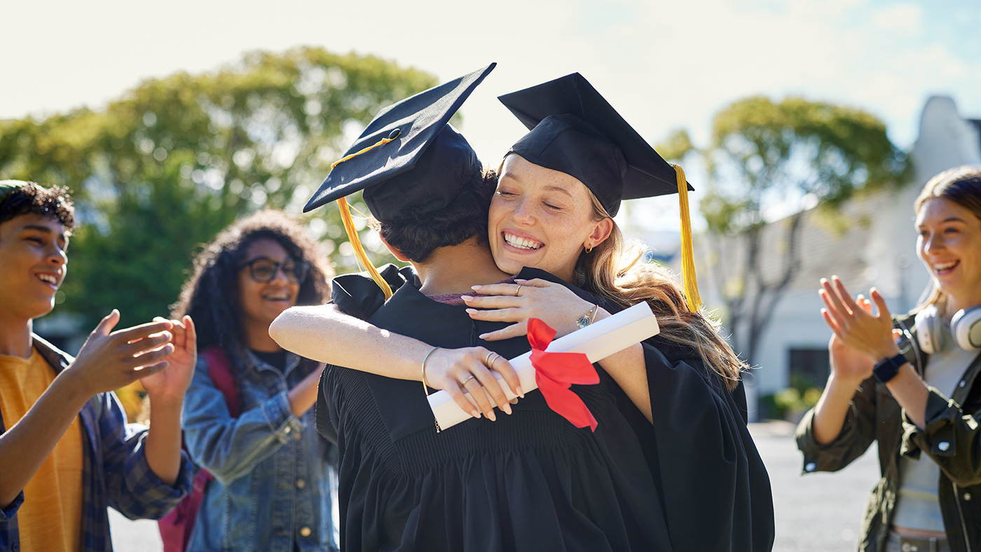 teen graduating and celebrating with their friends