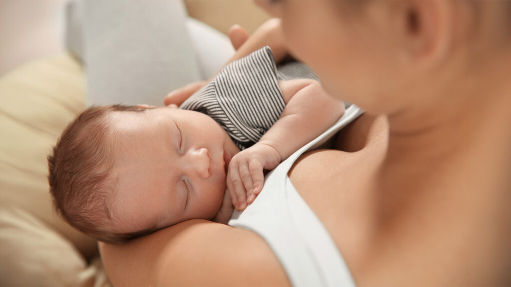Mother holding her newborn in her arms