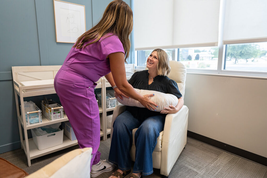 IBCLC lactation consultant demonstrates Bopee usage.